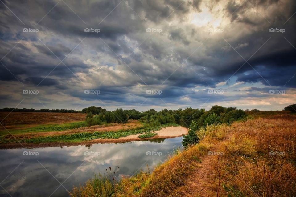 Summer landscape at cloudy day