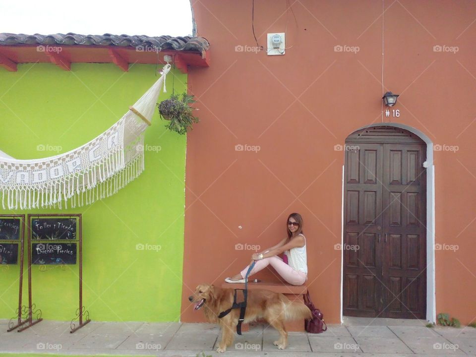 amazing woman whith dog. she live in the El Salvador and visit suchitoto City