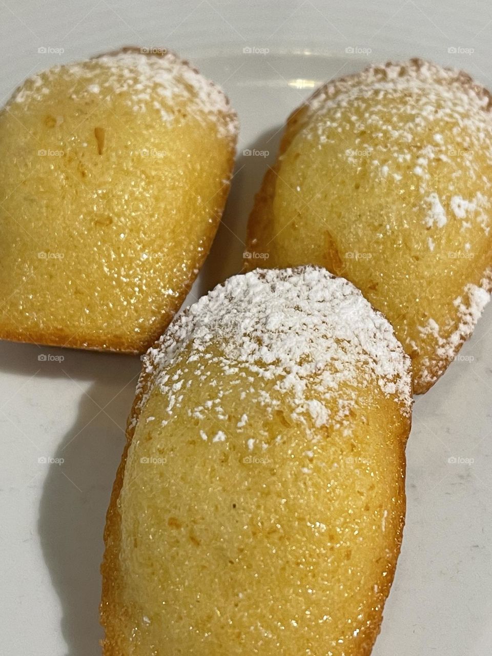 Madeleines small sponge cakes, French patisserie, freshly baked madeleines 