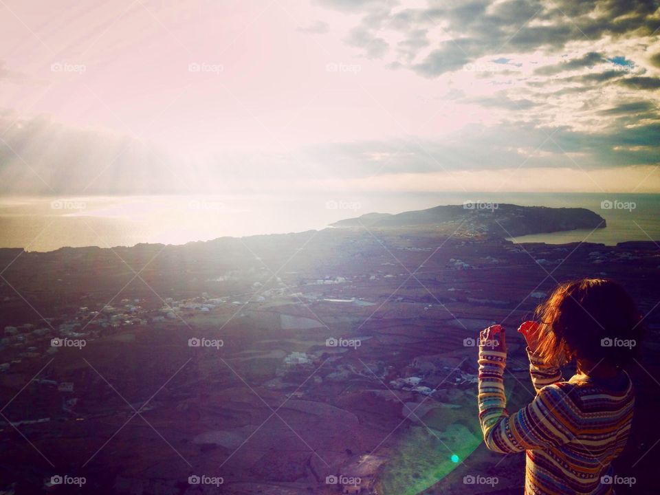 Watching sunset at Santorini 