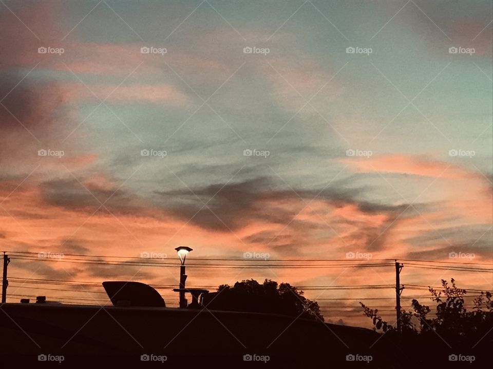 Good Early Morning Can You Here the Crack Of Dawn. Beautiful Green Hues Some Yellows, Oranges,Pinks turning to Dark Hues just making Sunrise More Special.