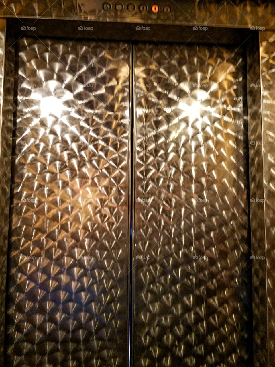 Highly polished metal elevator doors!