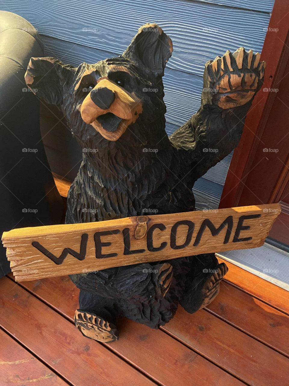 Carved wooden welcome bear
