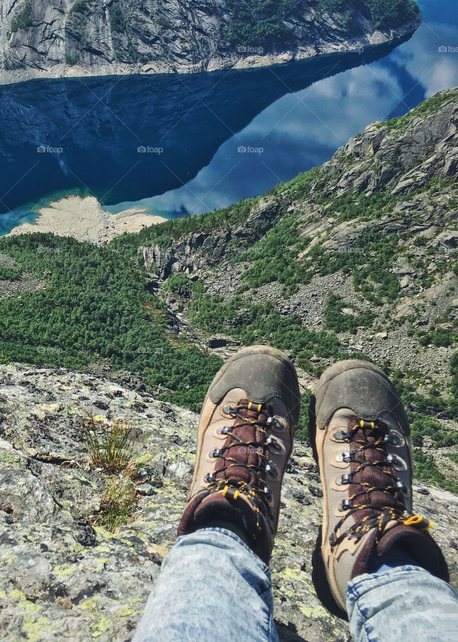 Hiking boots above the lake 