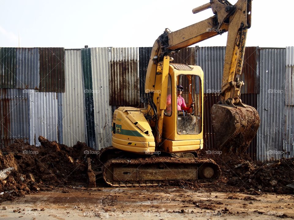 backhoe digger excavator. a heavy equipment  truck called excavator at a construction site