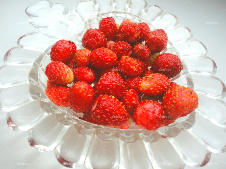 Strawberries in heart shape plate