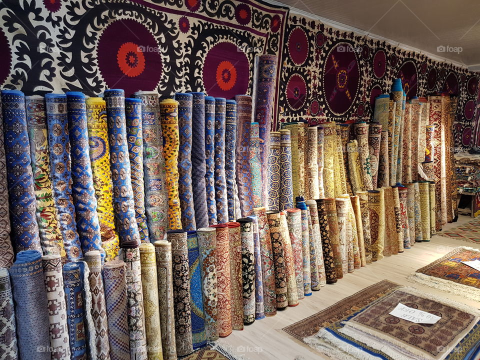 Colorful silk carpets in the showroom of a carpet factory in Uzbekistan