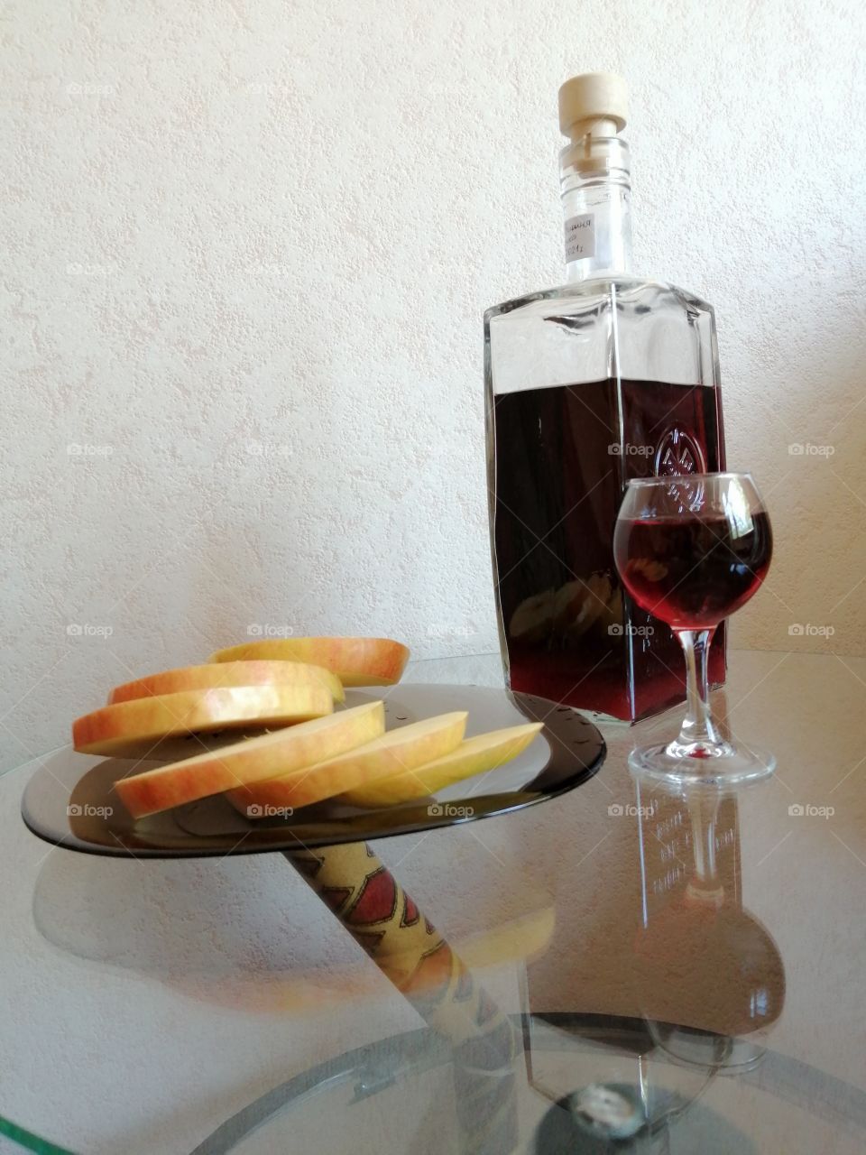 Stack. Bottle. Table. Fruits.