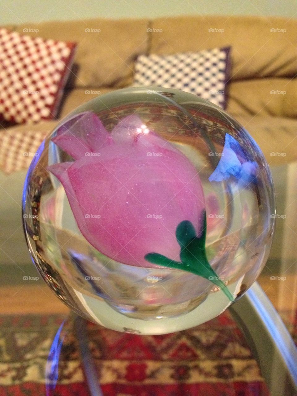 Pink flower inside crystal ball