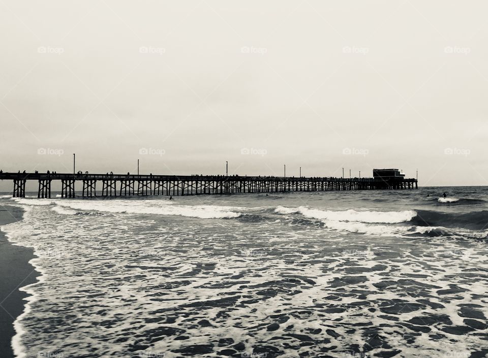Newport Beach Pier just before sunset on a day in late May 2018. Newport Beach, California 