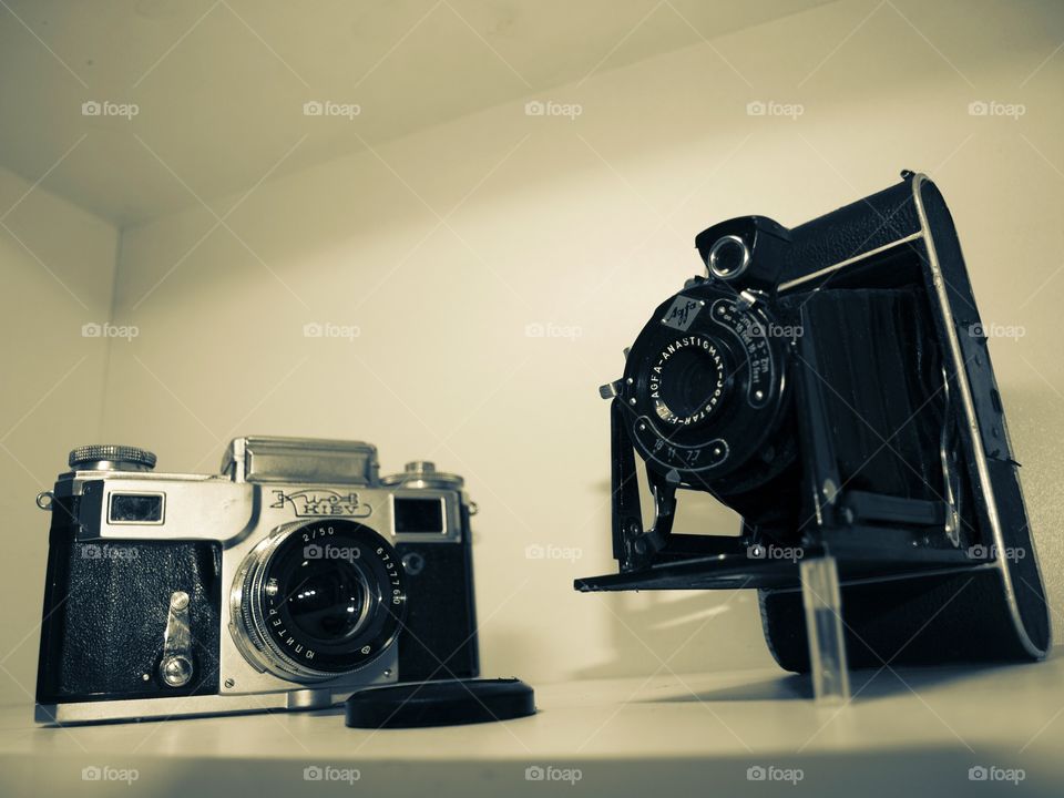 Two old/vintage film cameras, camera evolution