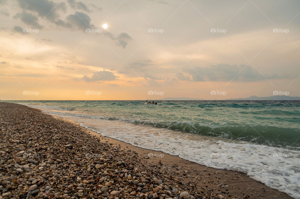 Fisherman on his little fishing boat.