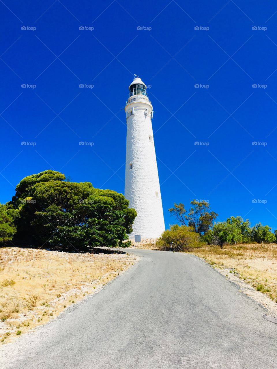 View of a lighthouse from below. 