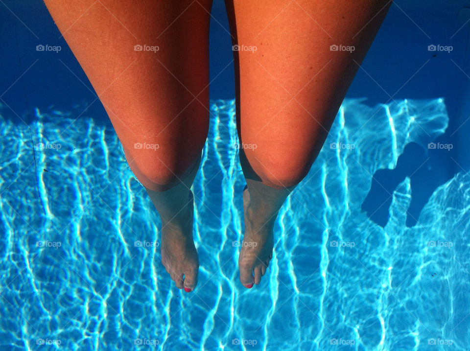 Legs in swimmingpool