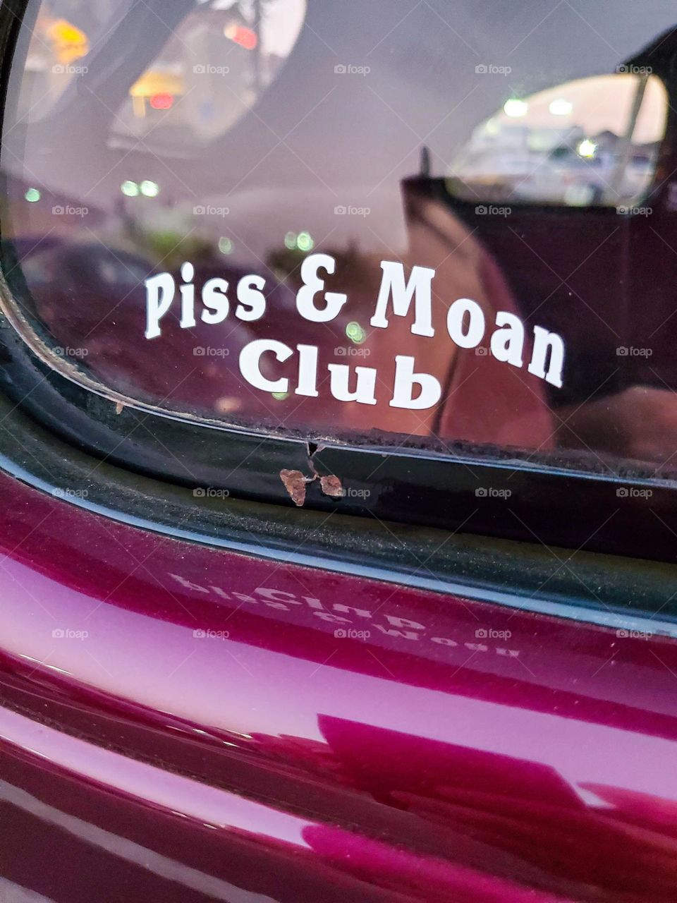 A whimsical decal on a classic American hot rod