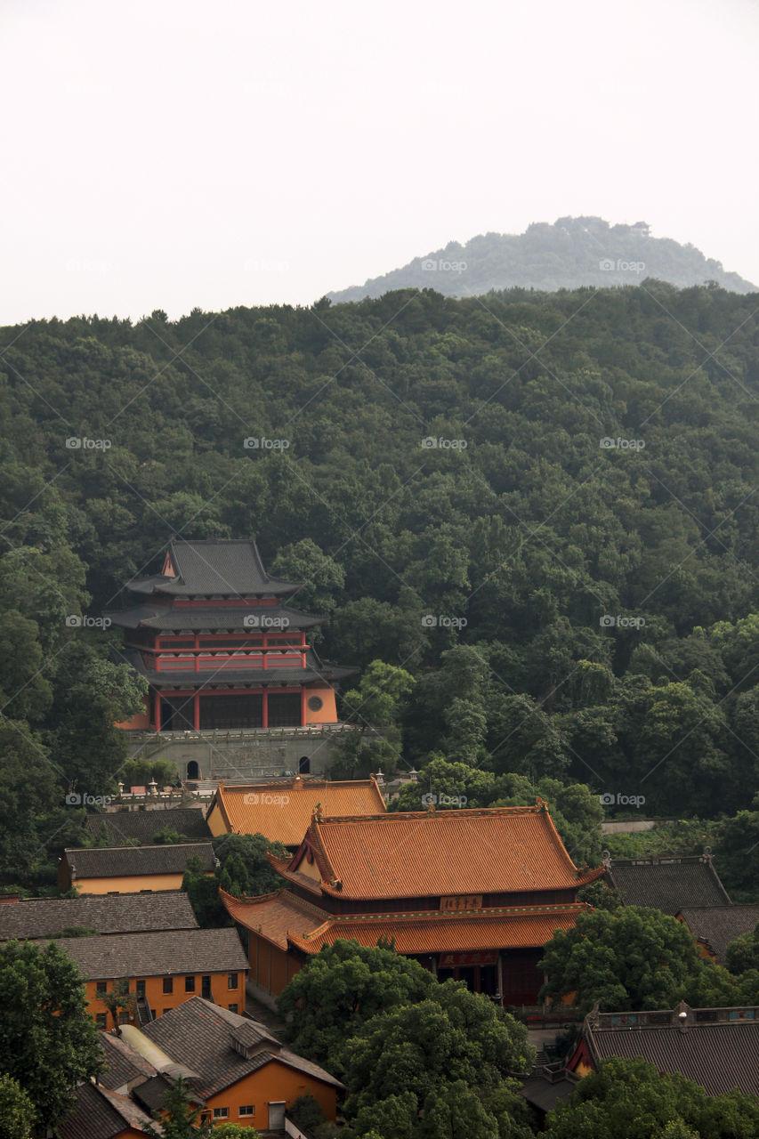 Traditional Chinese temple in the mountains at the dragon well in China.