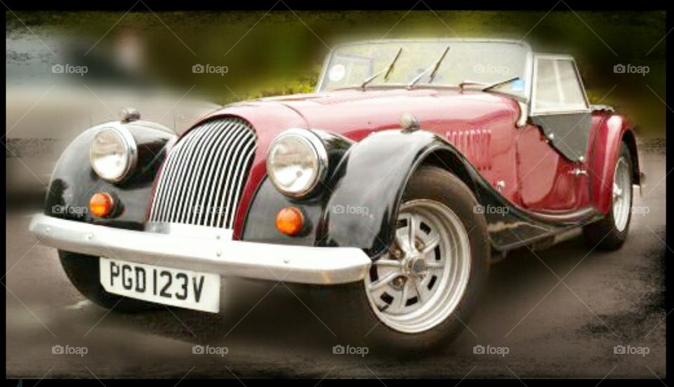 red and black cabrio clasic car