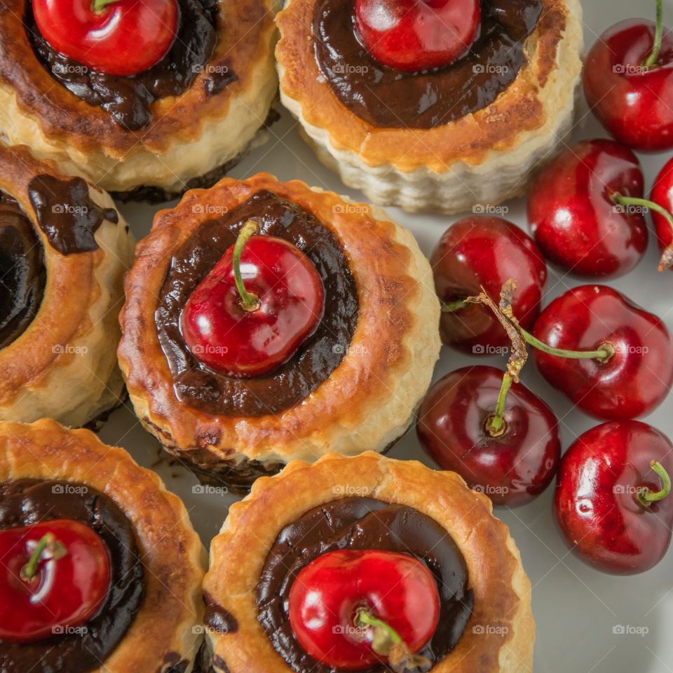 Chocolate cupcake with cherries