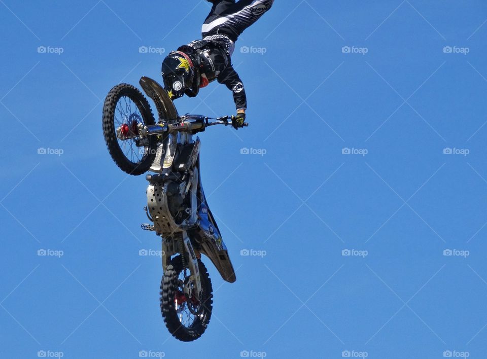 Insane Motorcycle Stunt. Expert Rider Performing Aerial Motorcycle Acrobatics
