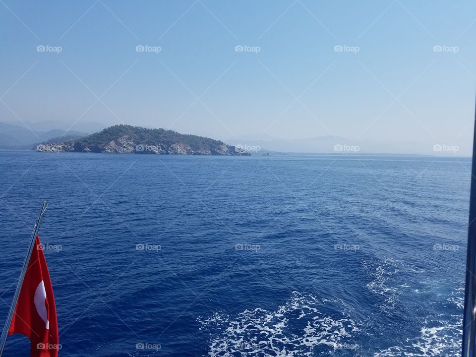 islands behind the boat on a boat tour near fethiye turkey