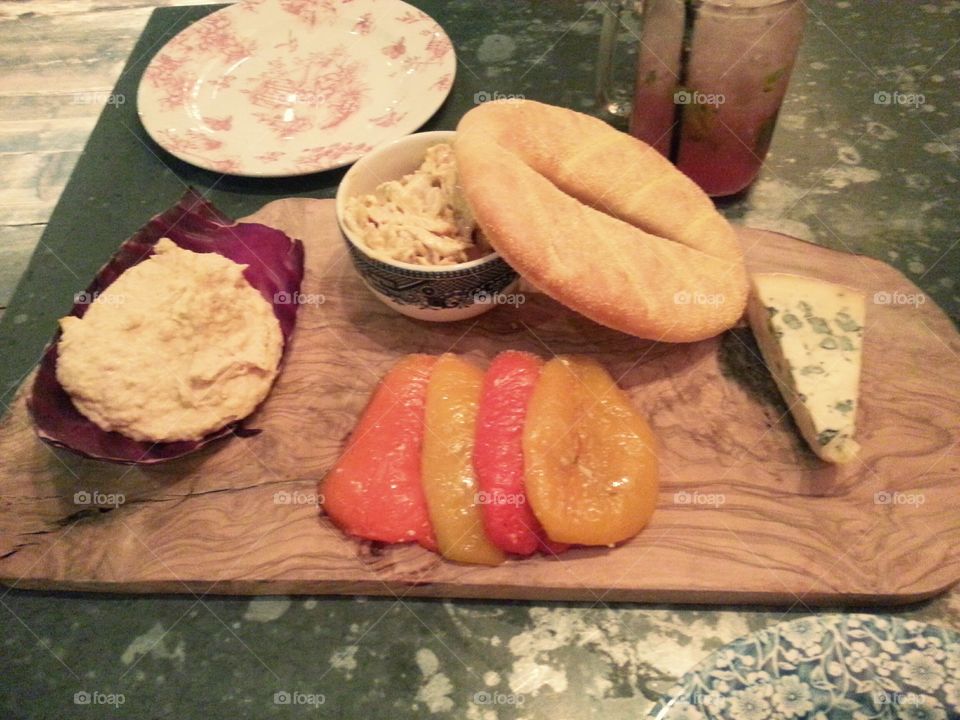 Dinner / Snacks. Hummus, Bread, Coronation Chicken, Roasted Red & Yellow Peppers, Blue Cheese, Watermelon Cooler
