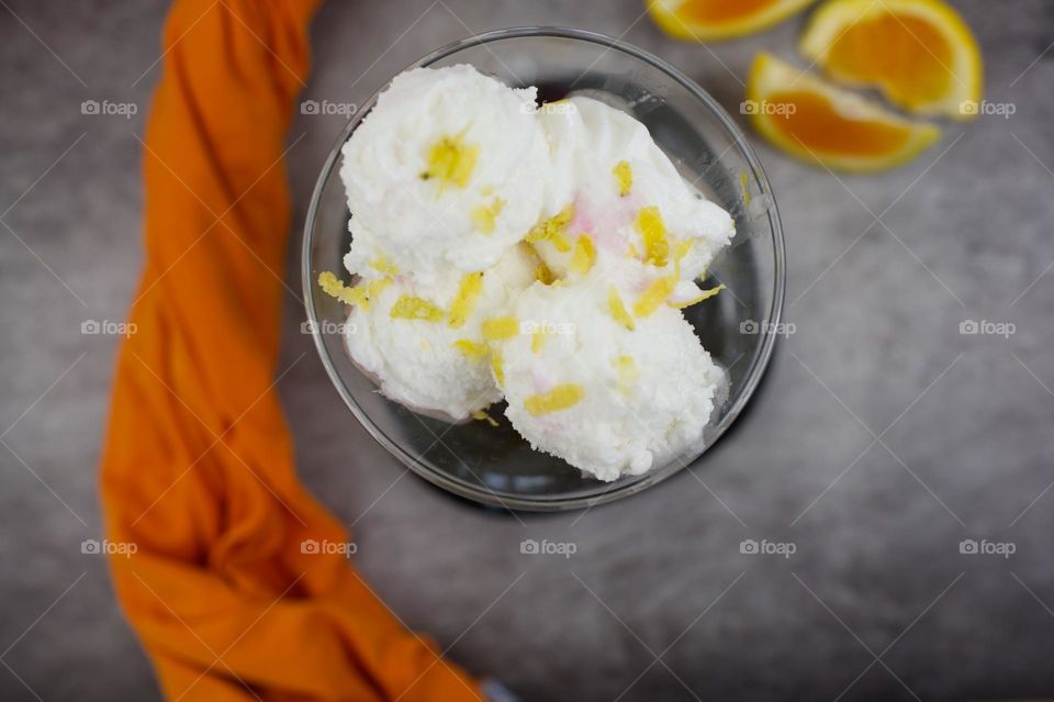 ice cream cup with orange flakes