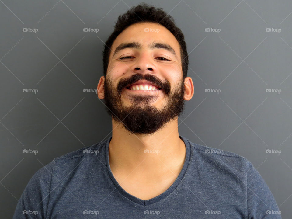 Man smiling showing hapiness