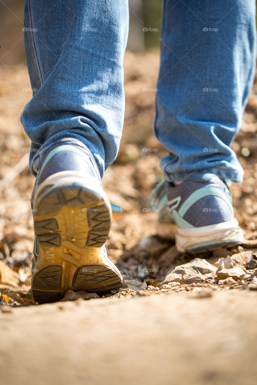 My hobby - I love walking running trail runs and hikes outdoors. Image of person walking close up outside