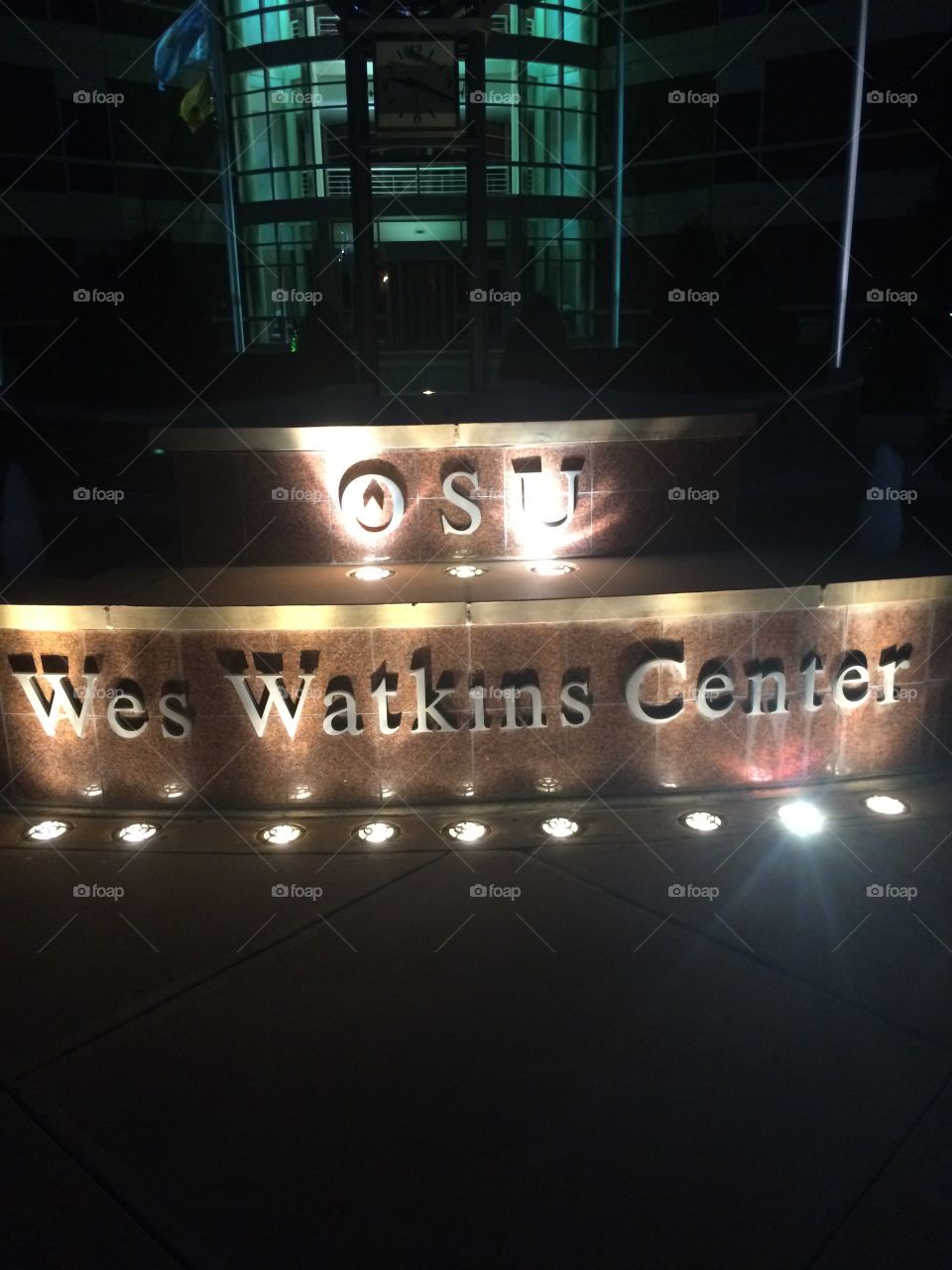 Oklahoma State University Wes Watkins building lights at night. 