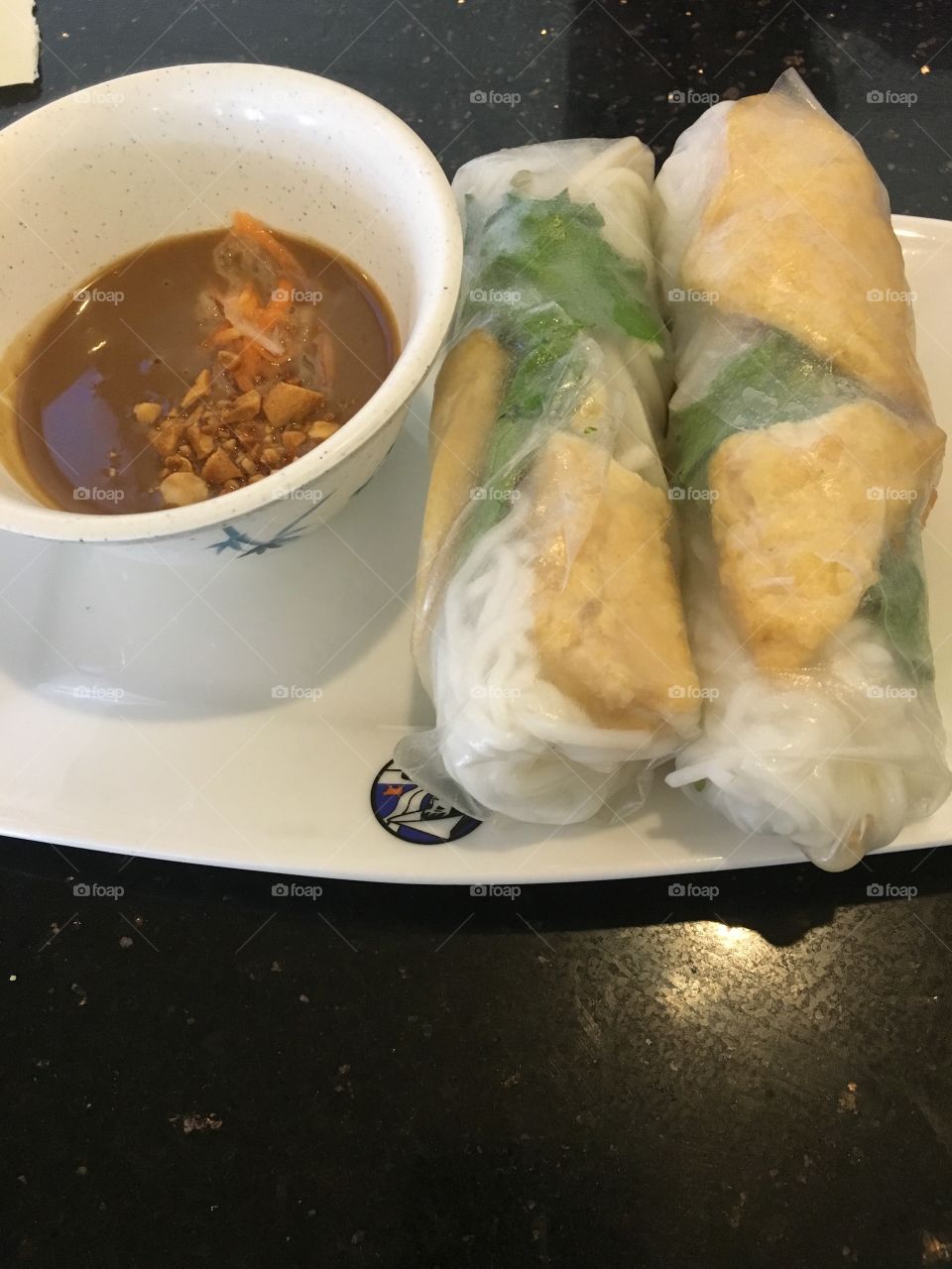 Tastes of Vietnam always make my tummy rumble with excitement. The peanut sauce and the greens and tofu wrapped in this rice roll are yummy! This is a great dish for Vegetarians.