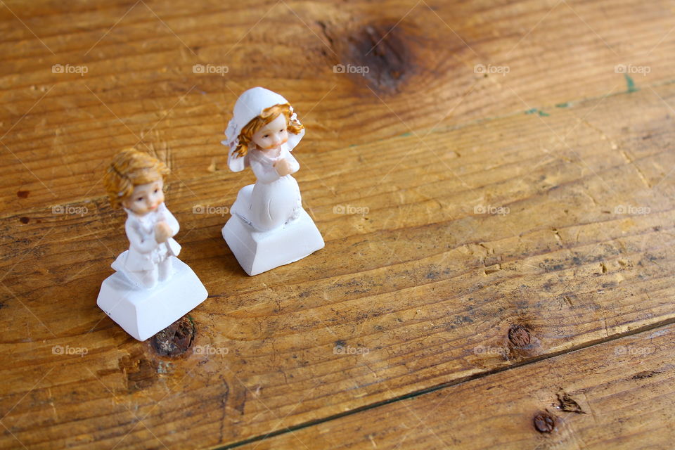 miniature praying toy figurine