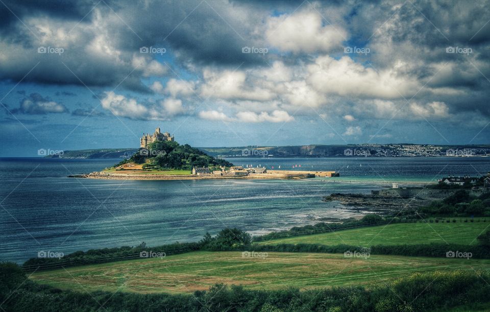 St Michael's Mount is an island in Cornwall that can be accessed by a stone causeway when the tide is out.