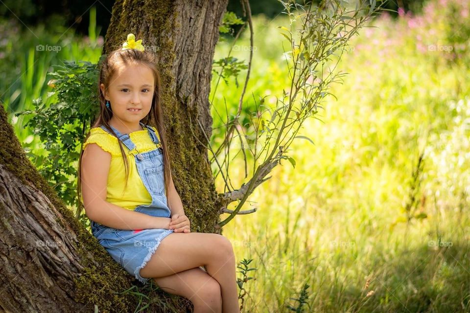 Posing Girl in Tree