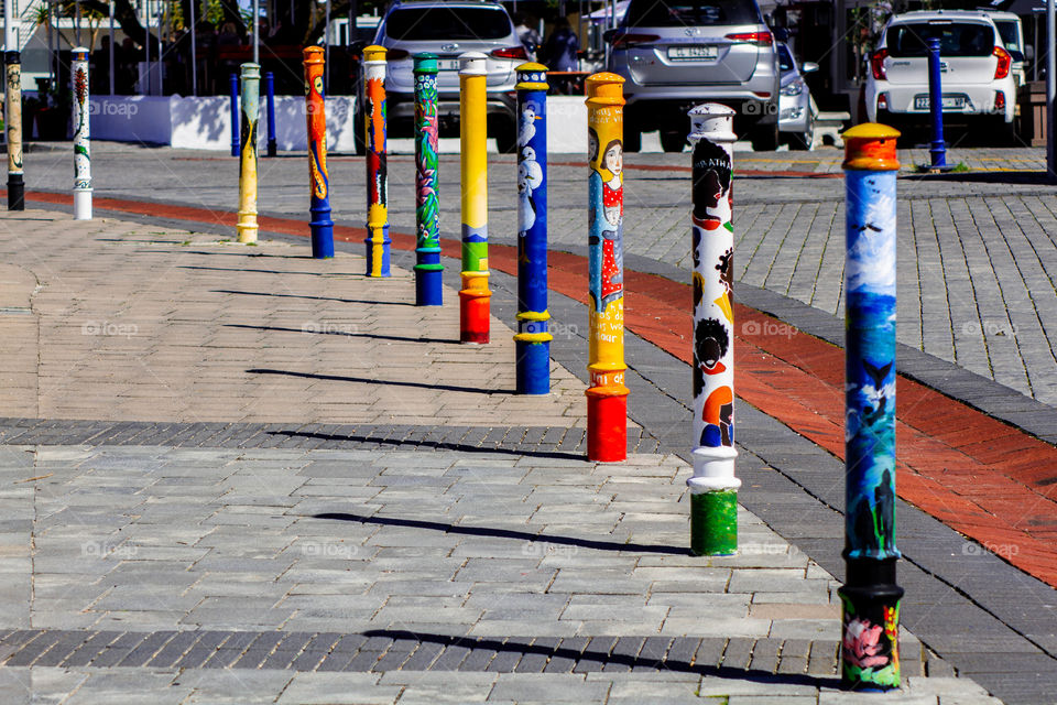 Poles on road pavement