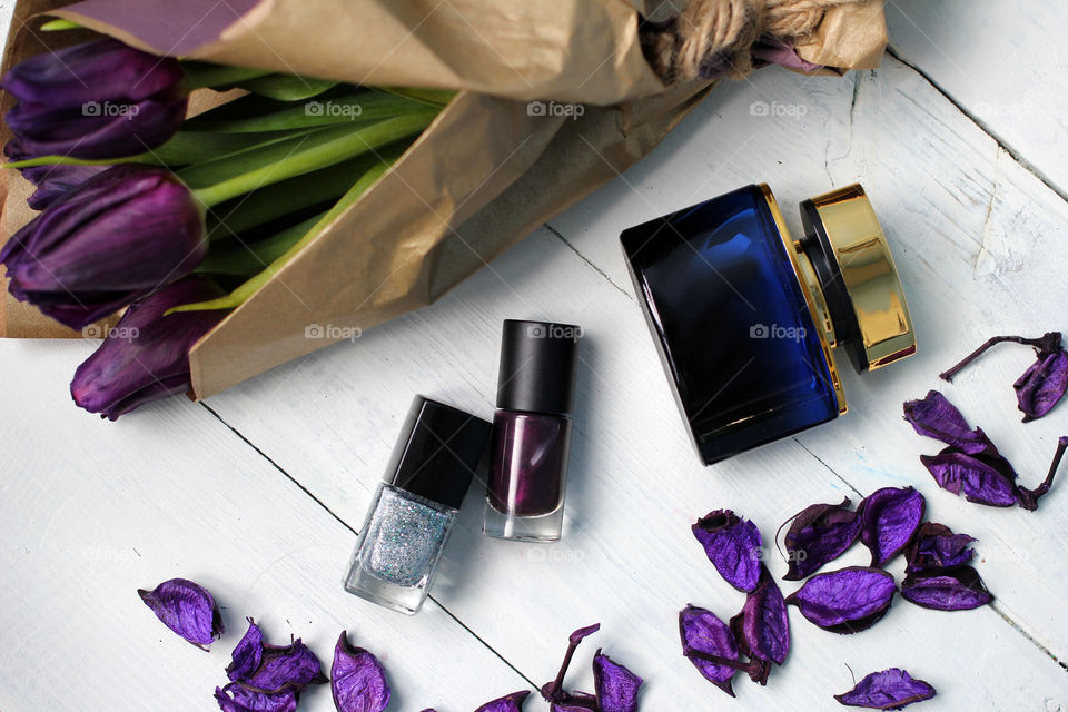 A bouquet of tulips and purple nail polish: congratulations, March 8 (International Women's Day), February 14th (Valentine's Day), holiday, decoration