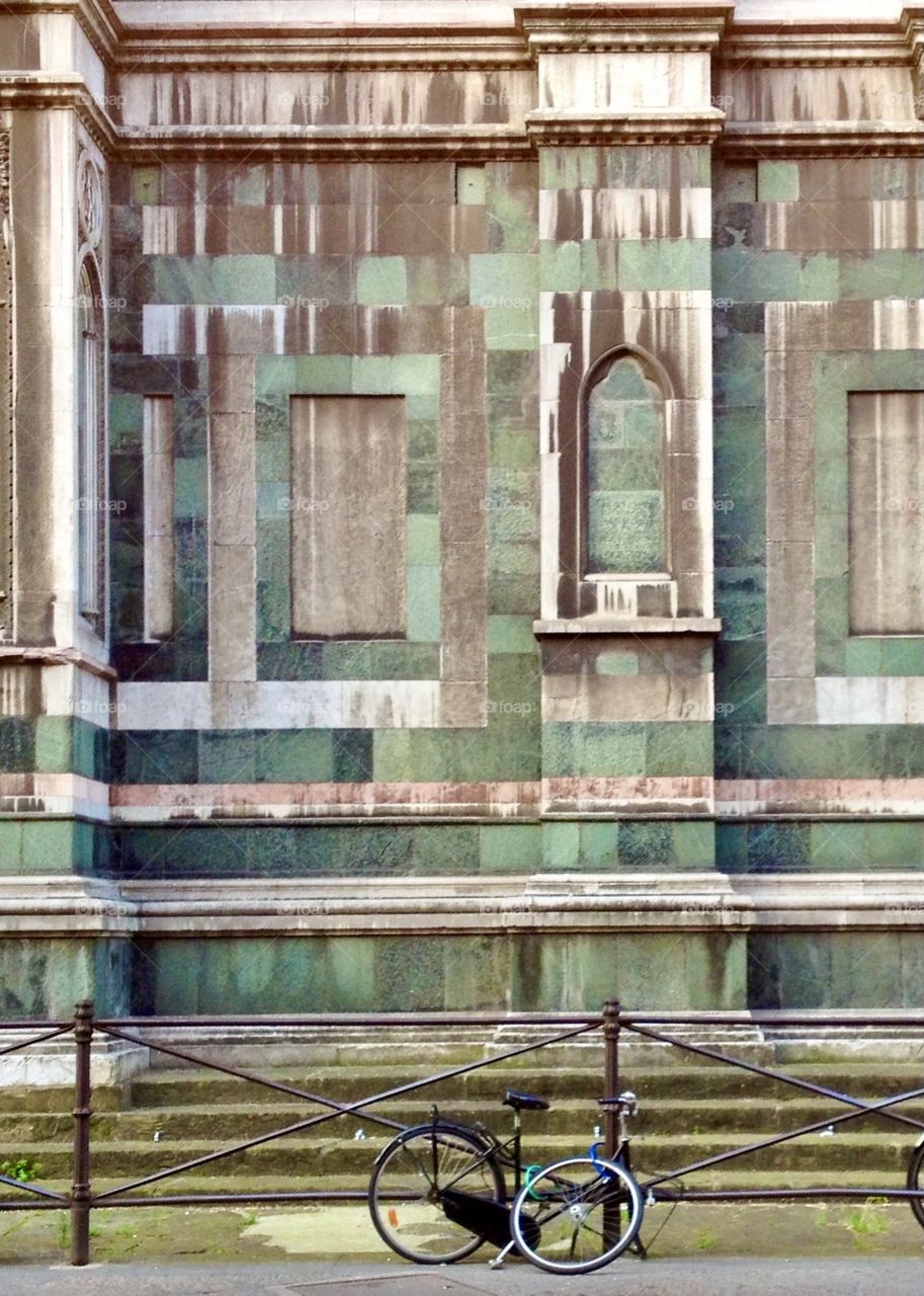 Bicycle and cathedral wall