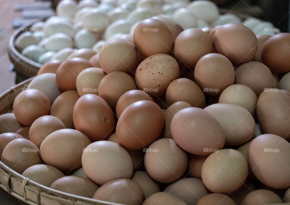 Fresh hen eggs in the market