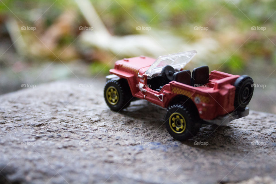 Red toy jeep