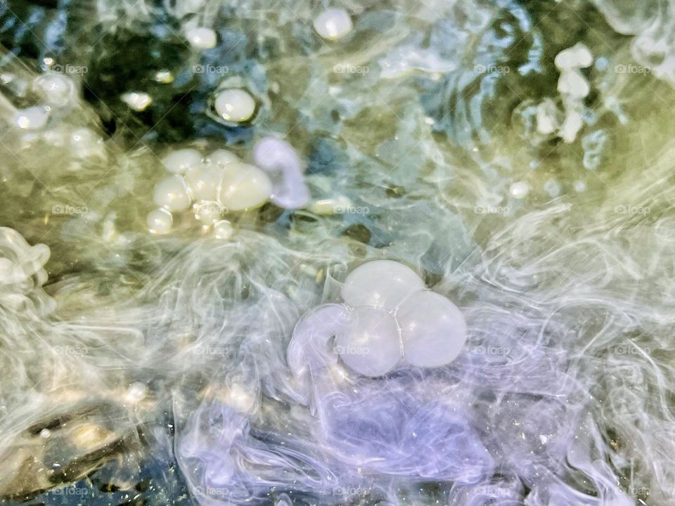 Smoke and bubbles from dry ice in water