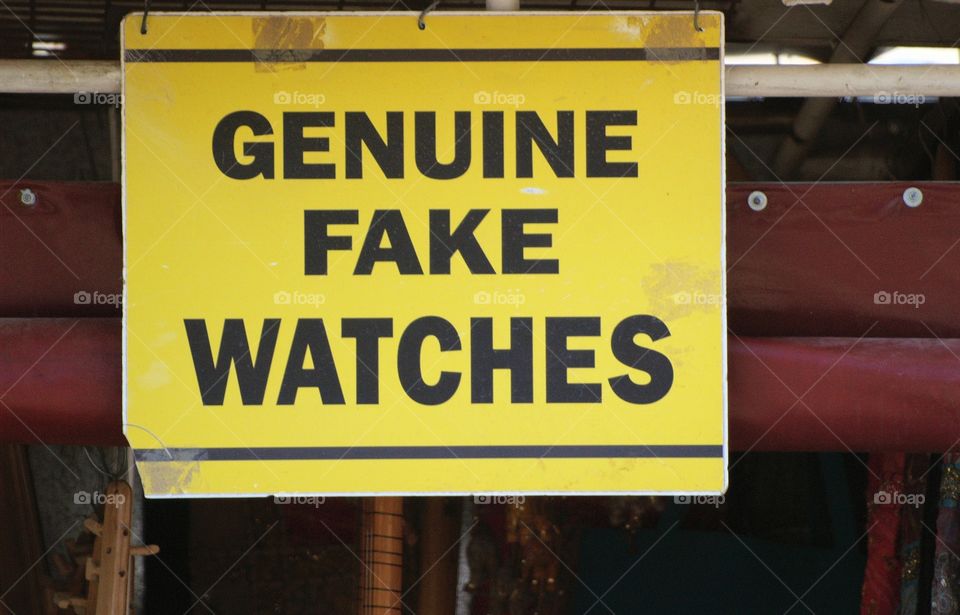 A sign  at the market in Ephesus, Turkey advertising "Genuine Fake Watches"