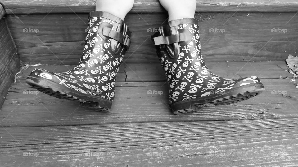 rain boots. black and white rain boots