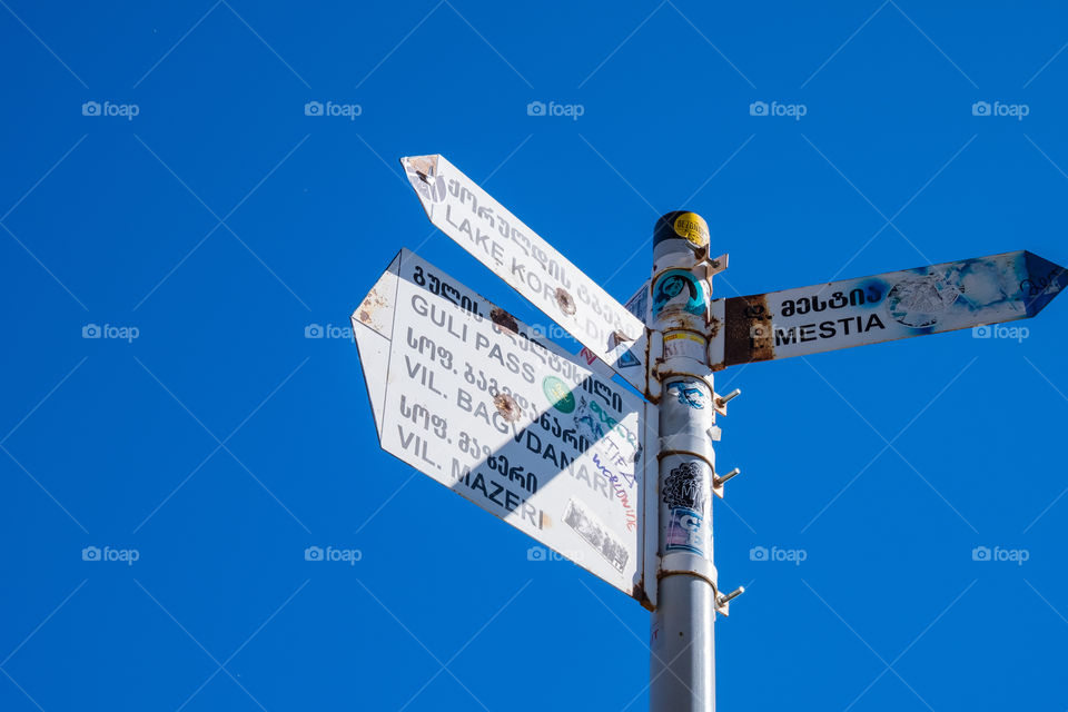 Sign on blue sky background