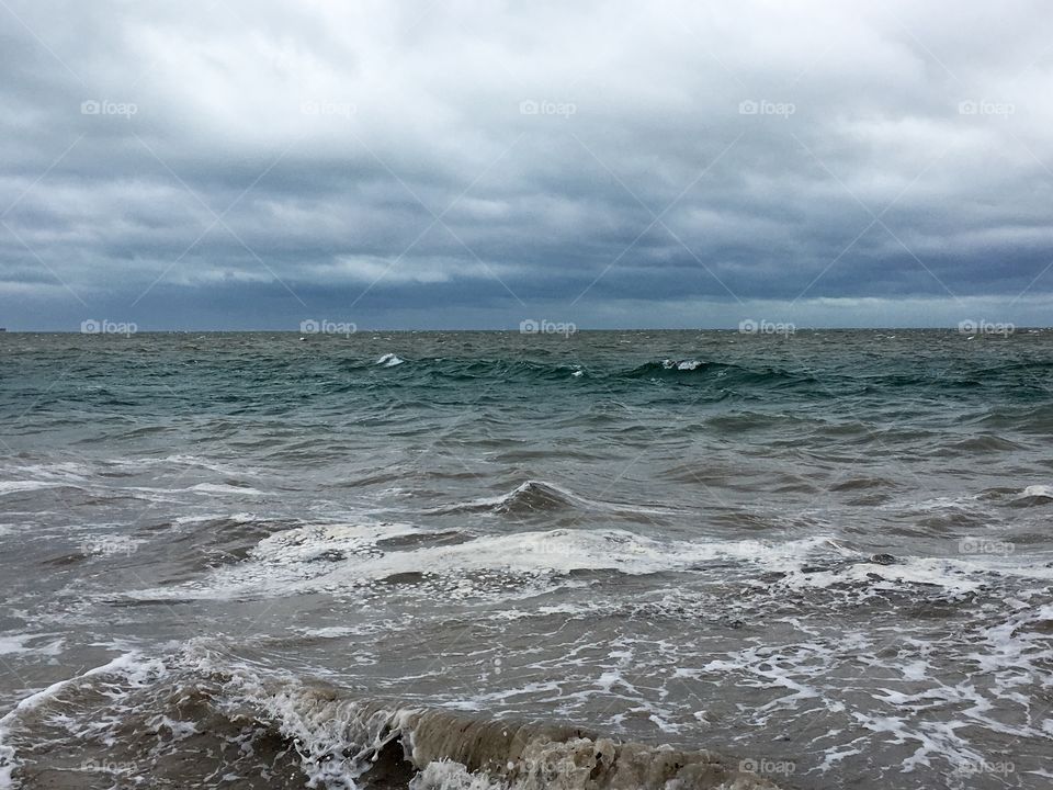 Ominous clouds over sea