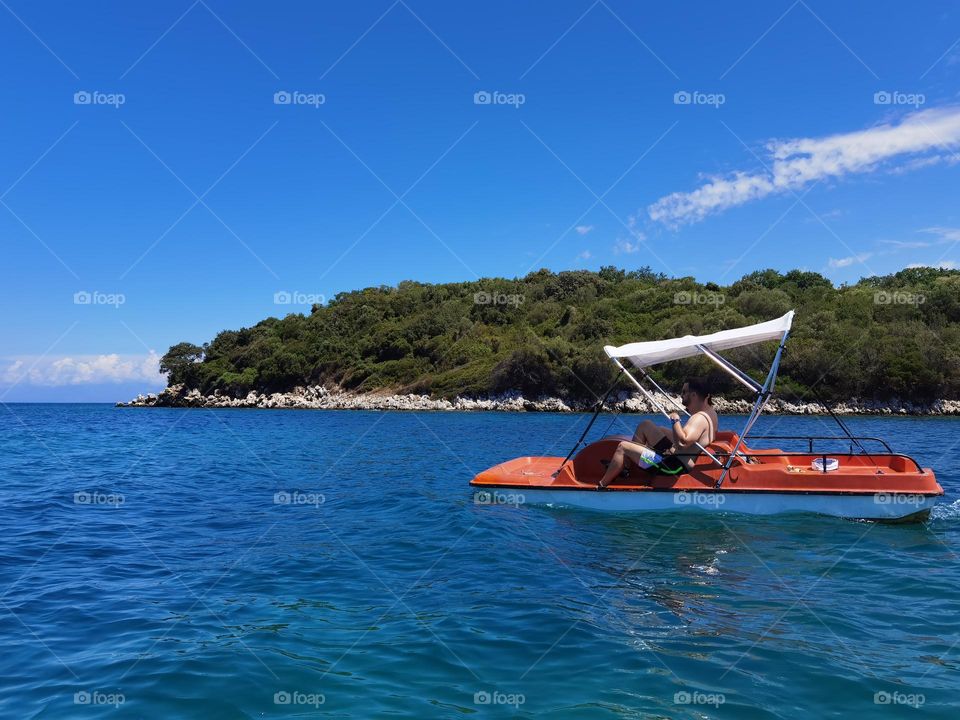 Paddling in the midst of the sea