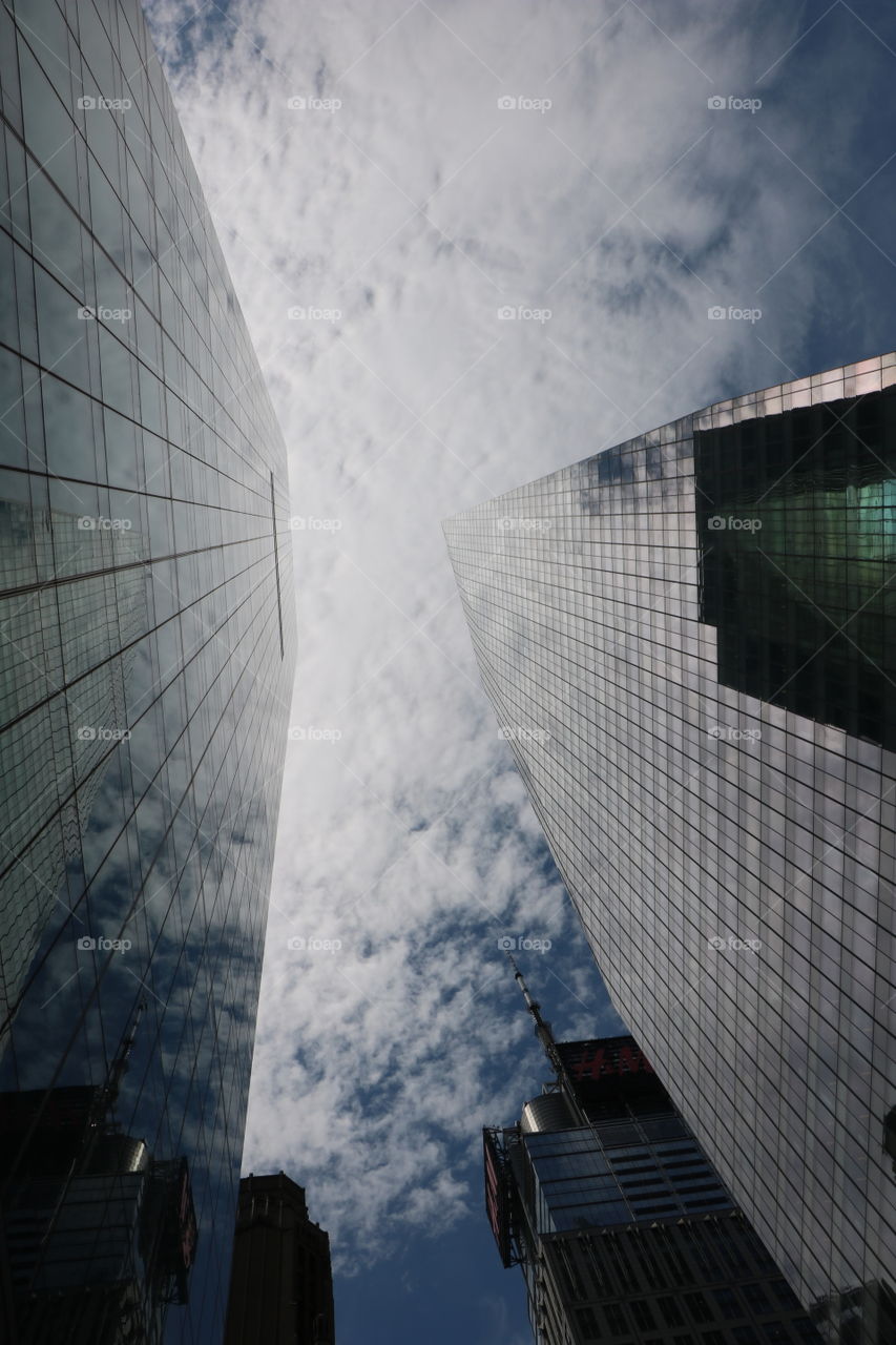 Skyscrapers heading up into clouds 