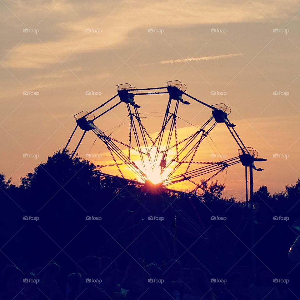 Ferris Wheel at sunset. took this photo during the Kent Island fire department carnival in Stevensville maryland while my kids where riding it.