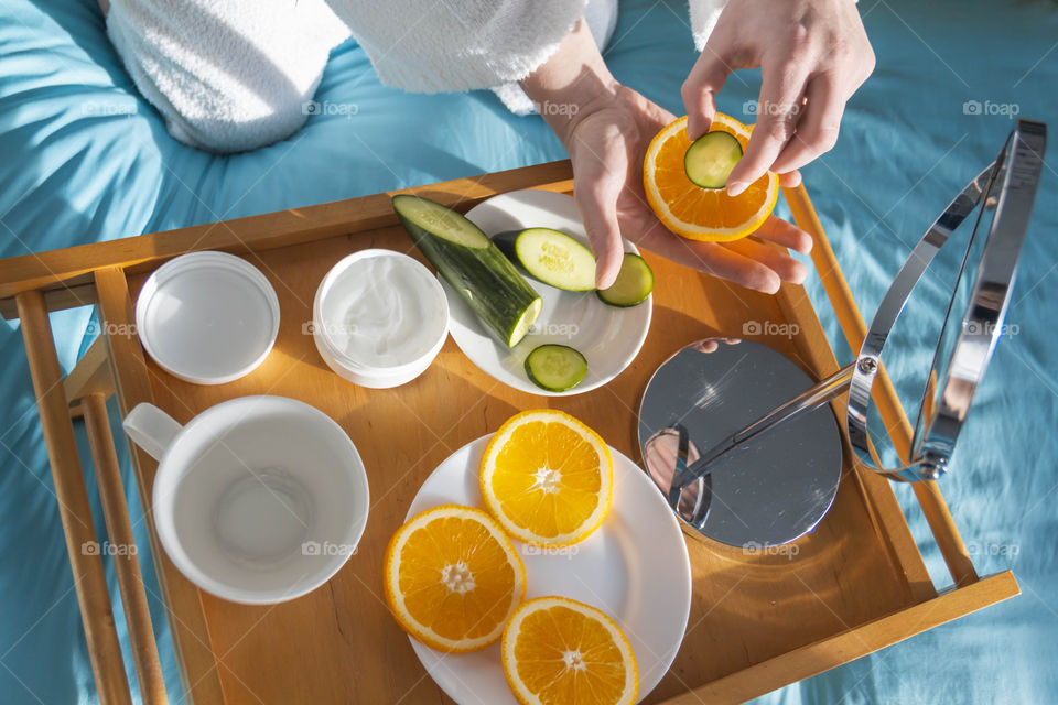 Man eating breakfast with vegetables and fruits