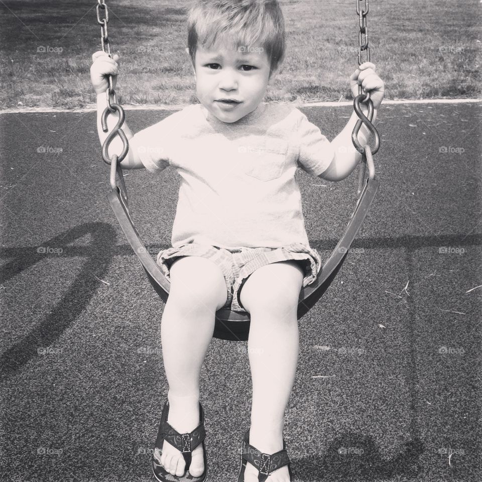 Swinging. My son at the park 