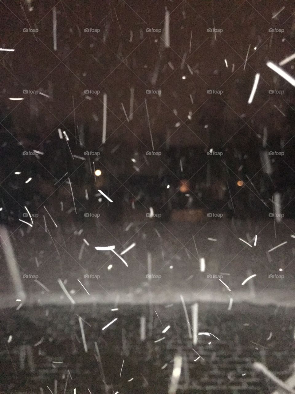 Snow hitting the light 