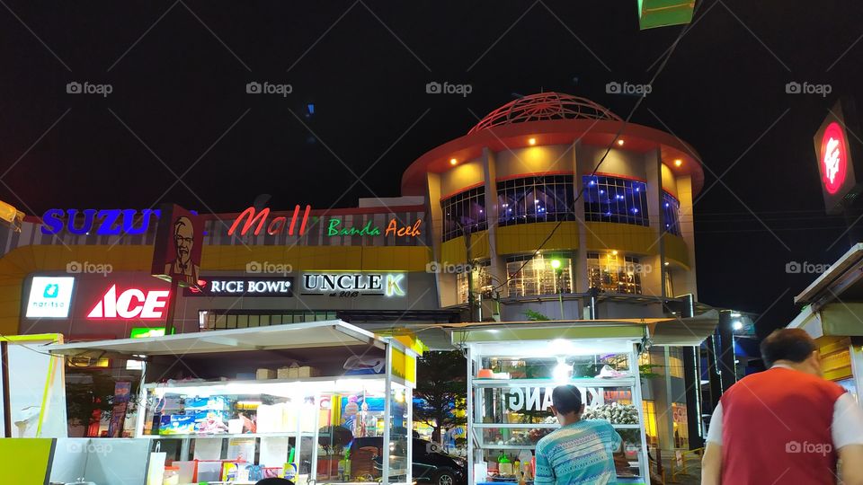 small traders ini front of shopping centers